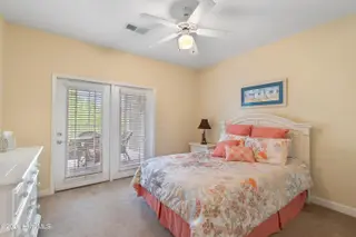 221 Woodlands Way Unit 21, Calabash, NC 28467 — 2-bedroom condo in Crow Creek, Calabash, NC, photo 19 of 39: Guest Bedroom