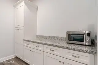 610 Bright Harvest Drive, Maysville, NC 28555 – photo 18: Butlers Pantry in Laundry Room