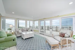301 Salter Path Road 14 Genesis, Pine Knoll Shores, NC 28512 – photo 5: Light-filled living room w/ corner views