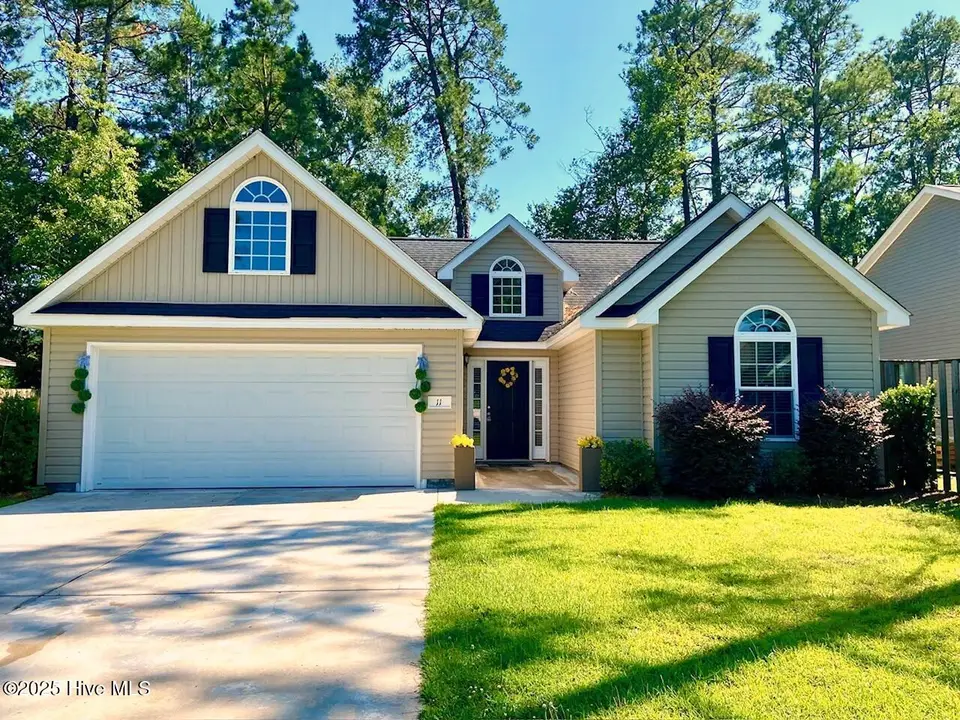 11 Court 11 Northwest Drive NW, Carolina Shores, NC 28467 — 3-bedroom home in Carolina Shores, Carolina Shores, NC, photo 1 of 28: Front view