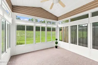 505 Village Green Drive A, Morehead City, NC 28557 – photo 23: Sunroom with powered blinds