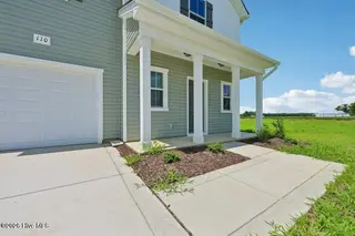110 Rider Road, Pikeville, NC 27863 – photo 3: COVERED PORCH 110 RIDER