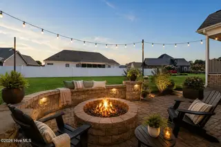 109 Michelle Dawn Drive, Goldsboro, NC 27534 – photo 18: 5 Backyard patio staged with AI