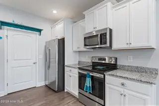 106 NW 19th Street, Oak Island, NC 28465 – photo 13: 36-web-or-mls-DSC01482
