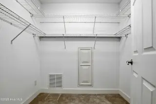 833 Fifty Lakes Drive, Southport, NC 28461 – photo 21: Primary Walkin Closet