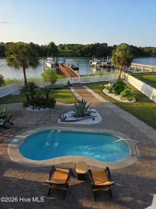 1404 W Yacht Drive, Oak Island, NC 28465 – photo 21: Outdoor summertime 2