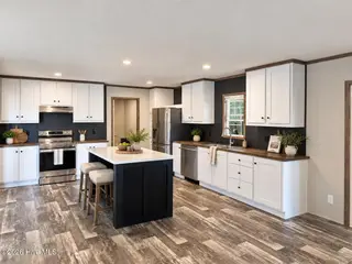 459 Orchard Lane SE, Bolivia, NC 28422 — 4-bedroom manufactured home in Vineyard Landing, Bolivia, NC, photo 2 of 4: Kitchen