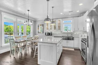 804 E Oak Island Drive, Oak Island, NC 28465 – photo 11: 12-Final 804 E Oak Island Dr-RJREM-0069