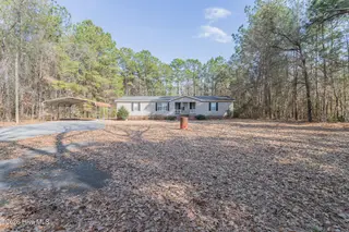 210 Creek Bank Drive, New Bern, NC 28560 — 3-bedroom manufactured home in Creekwater Haven, New Bern, NC, photo 6 of 58: Front