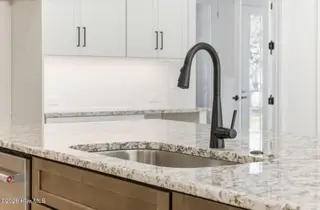 1943 Redfish SW, Supply, NC 28462 — 4-bedroom home in Oyster Harbour, Supply, NC, photo 19 of 42: Kitchen