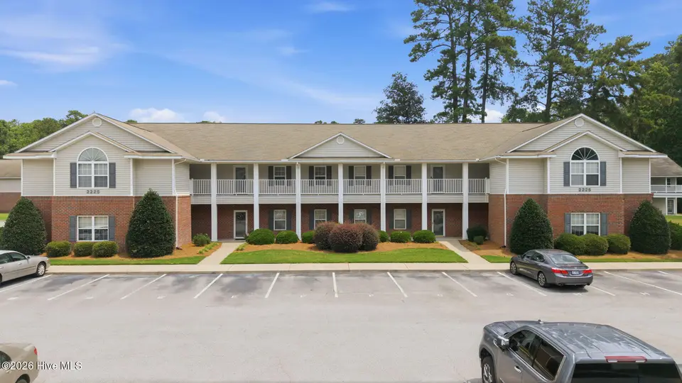 2225 Locksley Woods Drive F, Greenville, NC 27858 – photo 1 of 52: 1-web-or-mls-DJI_20260625115453_0424_D