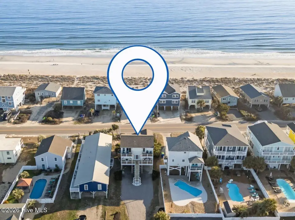 1116 E Beach Drive, Oak Island, NC 28465 – photo 1 of 49: drone water