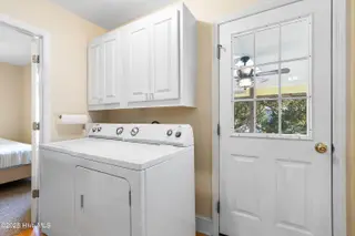 166 NW 7th Street, Oak Island, NC 28465 – photo 22: Laundry area