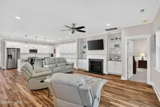 460 Summerhouse Drive, Holly Ridge, NC 28445 – photo 7: open kitchen and living area