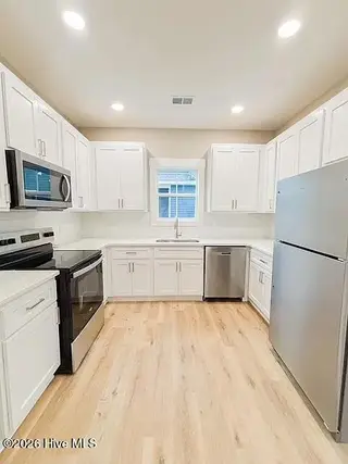907 Wooster Street, Wilmington, NC 28401 – photo 12: 611ce004047c912aedad9200ce63c1ae-cc_ft_1