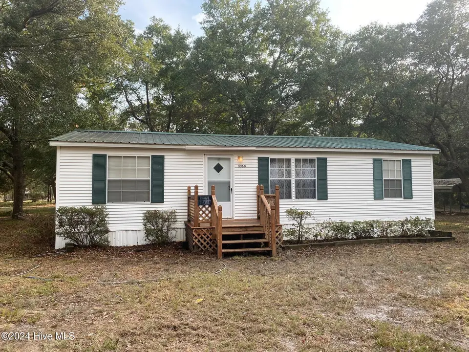 3360 Ashford Street SW, Shallotte, NC 28470 — 3-bedroom manufactured home in Chadwick Landing, Shallotte, NC, photo 1 of 19: New Front