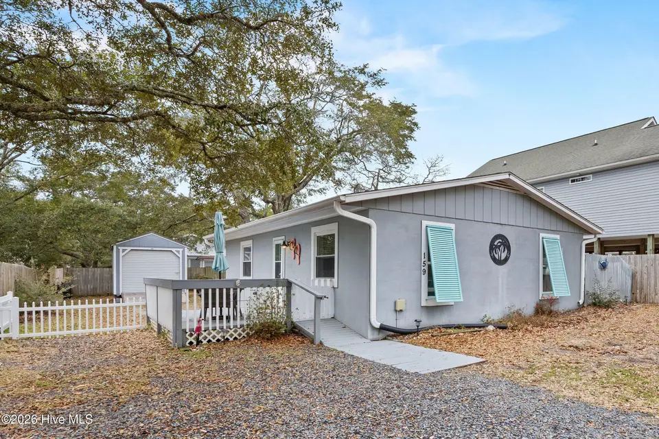 159 NW 4th Street, Oak Island, NC 28465 – photo 1 of 46: 3_front exterior