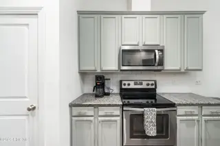 8112 Saltcedar Drive, Wilmington, NC 28411 – photo 13: Kitchen w/ Pantry