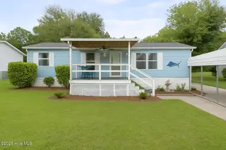 6617 Sago Palm Drive, Wilmington, NC 28412 — 3-bedroom manufactured home in Sago Bay, Wilmington, NC, photo 1 of 21: ChatGPT Image Jun 16, 2025, 12_34_45 PM