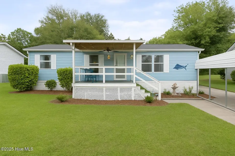 6617 Sago Palm Drive, Wilmington, NC 28412 — 3-bedroom manufactured home in Sago Bay, Wilmington, NC, photo 1 of 21: ChatGPT Image Jun 16, 2025, 12_34_45 PM