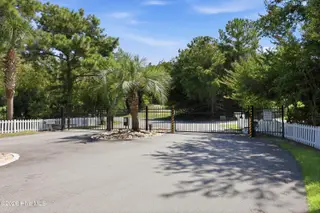 9936 Louise Howard Court East, Emerald Isle, NC 28594 — 3-bedroom townhome in Spinnakers Reach, Emerald Isle, NC, photo 21 of 32: Spinnakers Reach Entrance