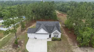 1340 Whitney Drive, Aberdeen, NC 28315 – photo 1: 8-web-or-mls-DJI_20230809100955_0162_D