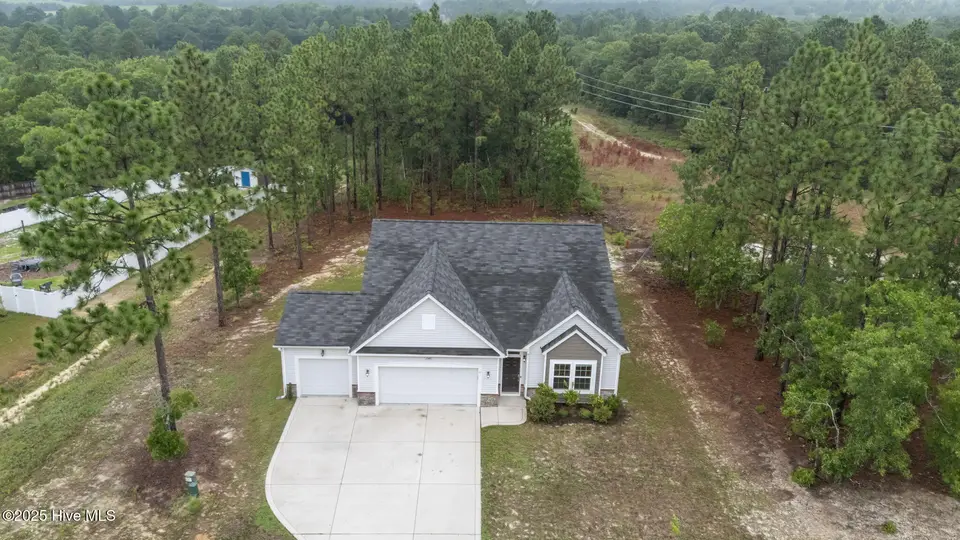 1340 Whitney Drive, Aberdeen, NC 28315 – photo 1 of 33: 8-web-or-mls-DJI_20230809100955_0162_D