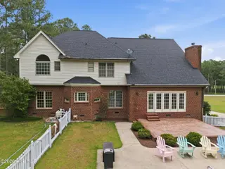 4076 Mobleys Bridge Road, Grimesland, NC 27837 – photo 5: 5-web-or-mls-DJI_20260622143736_0026_D