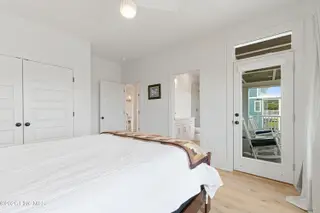 855 Cannonsgate Drive, Newport, NC 28570 – photo 17: First floor bedroom with porch access