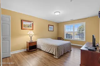 490 Little River Farm Boulevard 101a, Carthage, NC 28327 – photo 10: 490 LRFB A101 bedroom lake view