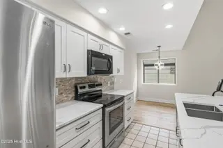 212 Kings Trail # A, Sunset Beach, NC 28468 – photo 3: Upstairs kitchen