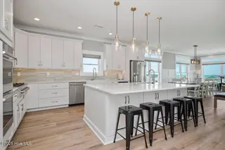 2918 E Beach Drive, Oak Island, NC 28465 – photo 24: Tan and No Plan pict15
