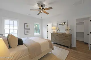 82 Northeast Drive NW, Calabash, NC 28467 – photo 12: 82NE Master bedroom with open closet, ba