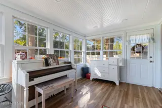 3838 Longleaf Drive NE, Elm City, NC 27822 – photo 14: 14-Alt Sunroom View