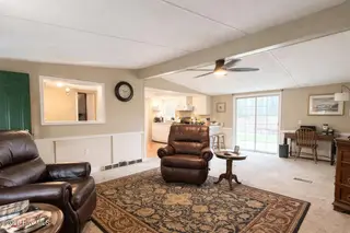 4905 Hunting Ridge Road NW, Wilson, NC 27896 — 3-bedroom manufactured home in Windemere, Wilson, NC, photo 6 of 16: Living Room