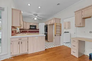 203 Red Snapper Drive, Emerald Isle, NC 28594 – photo 22: Dining to Kitchen view