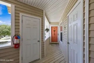 413 Commerce Avenue C, Morehead City, NC 28557 – photo 2: Front entrance with two storage rooms