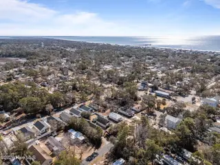 217 NE 75th Street, Oak Island, NC 28465 – photo 7: 11-web-or-mls-DJI_20260212110349_0008_D