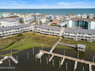 1405 Canal Drive Apt 17, Carolina Beach, NC 28428 – photo 3: 43-web-or-mls-1405 Canal Dr #17-45 copy