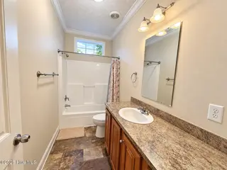 673 Pecan Road, Dudley, NC 28333 – photo 9: Hall Bathroom