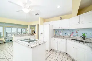 301 Salter Path Road 14 Genesis, Pine Knoll Shores, NC 28512 – photo 8: Spacious, eat-in kitchen w/ island