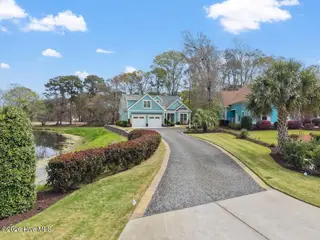 922 Oyster Pointe Drive, Sunset Beach, NC 28468 – photo 8: Front of Home