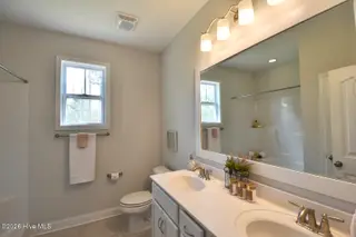 61 Bristol Bay Drive, Lake Waccamaw, NC 28450 – photo 8: Primary Suite Bath