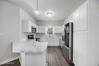 2041 Folkstone Woods Lane 10a, Holly Ridge, NC 28445 – photo 19: 20_kitchen