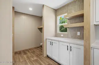 7601 Alice Court, Castalia, NC 27816 – photo 21: Laundry Area