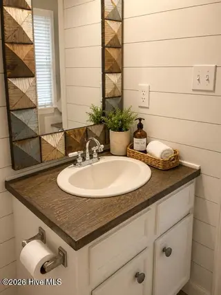 299 Lori Drive, Greenville, NC 27858 – photo 15: 299 half bath down