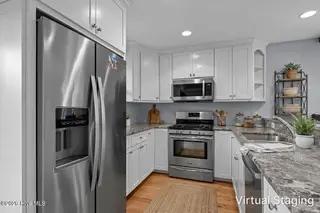7118 Archers Creek Drive, Emerald Isle, NC 28594 – photo 10: Staged with AI
