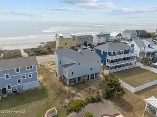 6618 W Beach Drive, Oak Island, NC 28465 – photo 2: 13-web-or-mls-DJI_20260304121820_0416_D