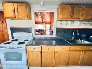 4021 E Beach Drive, Oak Island, NC 28465 – photo 10: IMG_2355