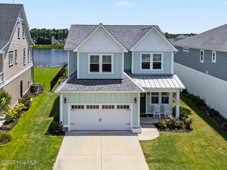 385 Summerhouse Drive, Holly Ridge, NC 28445 – photo 1 of 33: Summerhouse_Front Elevated